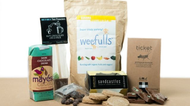 Selection of Yumvelope snacks and packaging